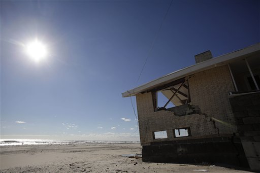 A storm-damaged beachfront house is shown in the Far Rockaways section of the New York City borough of Queens in January. Homeowners shaken by their Superstorm Sandy experience are putting their homes on the market, sometimes for rock-bottom prices. hurricane