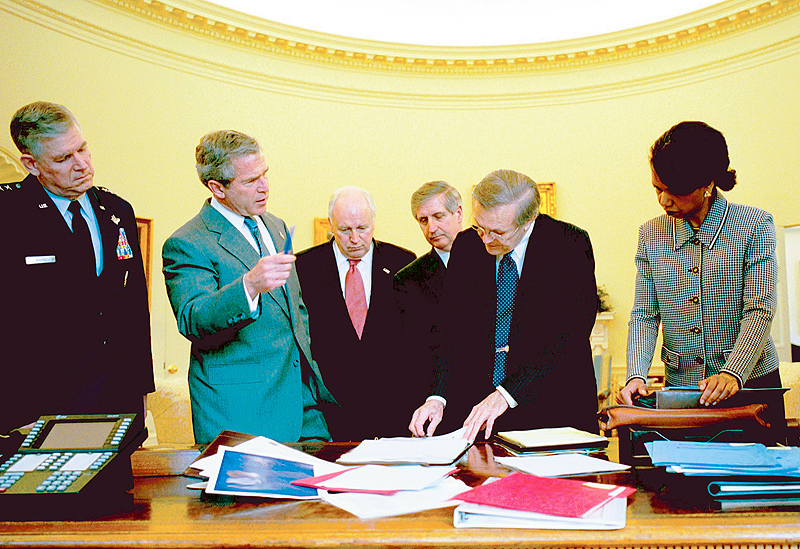 President Bush reviews the progress of the war with members of the War Council on April 2, 2003.