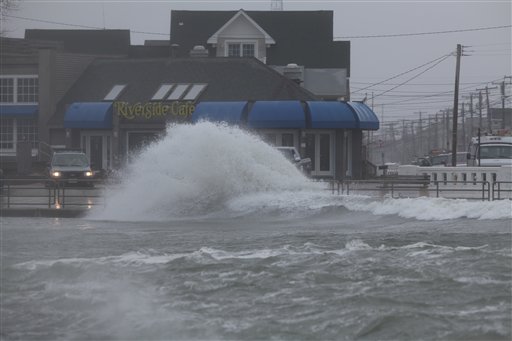 Wind, rain and the tide batter the Jersey Shore as a winter storm moves at the Point Pleasant inlet in Manasquan, N.J.