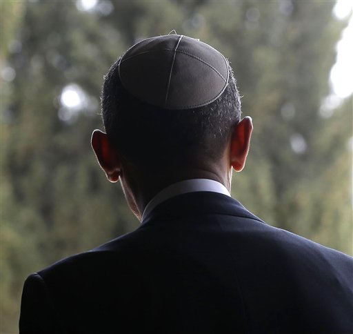U.S. President Barack Obama walks out of the Hall of Remembrance at the Yad Vashem Holocaust Memorial in Jerusalem, Israel, Friday, March 22, 2013. (AP Photo/Pablo Martinez Monsivais)