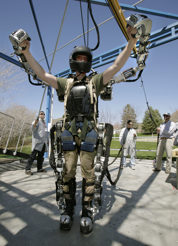 A Raytheon software engineer stretches in a robotic suit made for the Army in Salt Lake City in 2008. A reader says median salaries for software engineering and information technology jobs in Maine “tend to fall significantly behind national median salaries” for the same type of work.