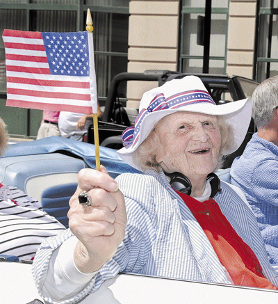 This July 2008 file photo shows Elsie Viles riding down Water Street on when she was the 2008 Independence Day parade grand marshal in Augusta.