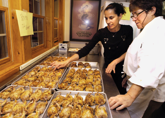 Melissa Kelly of Primo restaurant in Rockland, left, and Rebecca Charles of Pearl Oyster Bar in New York prepare a course at an event held at Arrows restaurant in Ogunquit in this 2005 photo.