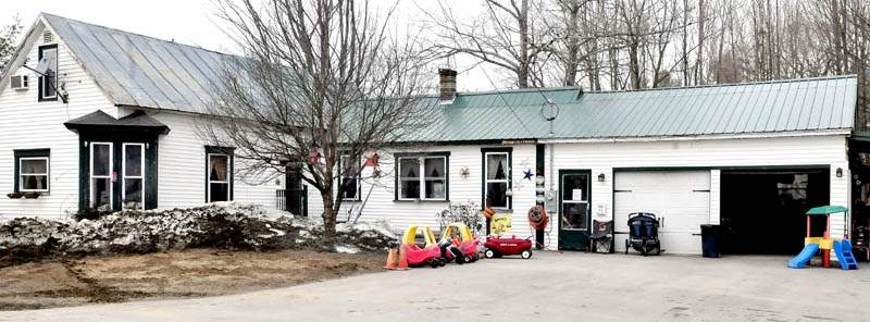 Children's toys can be seen outside the ABC 123 Daycare on Upper Main Street in Norridgewock on Monday, March 11, 2013. The state has shut down the center after the owner's husband was charged with unlawful sexual contact with three children earlier this month.
