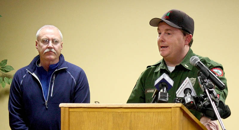 Maine Warden Service Lt. Kevin Adams, right, answers questions about the search for Nicholas Joy, of Medford, Mass., during a press conference Monday in Carrabassett Valley. At left is Richard Wilkinson, vice president of mountain operations at Sugarloaf, where the 17-year-old was last seen Sunday.