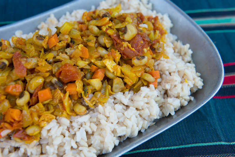 Jollof rice with black-eyed peas.
