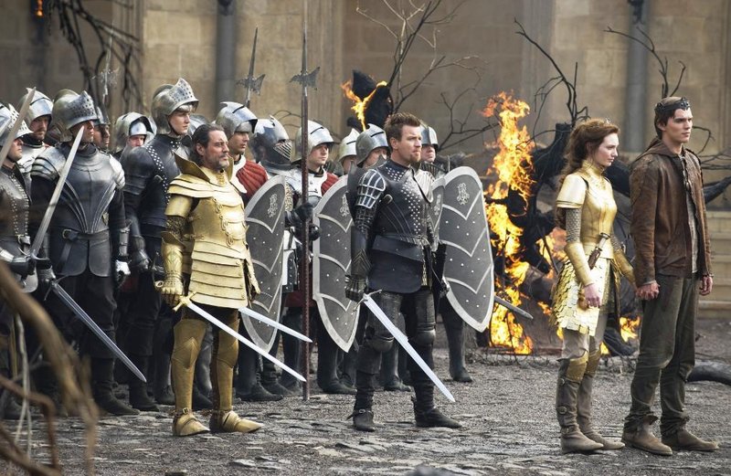 Ewan MacGregor, center, Eleanor Tomlinson and Nicholas Hoult in a scene from “Jack the Giant Slayer,” in which war between humans and a race of giants is reignited.