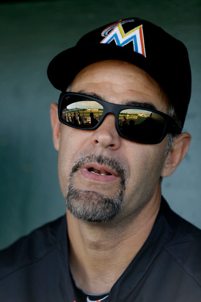 Mike Lowell went through some rough years with the Marlins, but it was worth it in 2003 when he helped the team win the World Series.