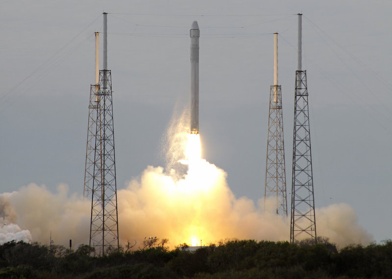 The Falcon 9 SpaceX rocket lifts off from launch complex 40 at Cape Canaveral, Fla., on Friday.