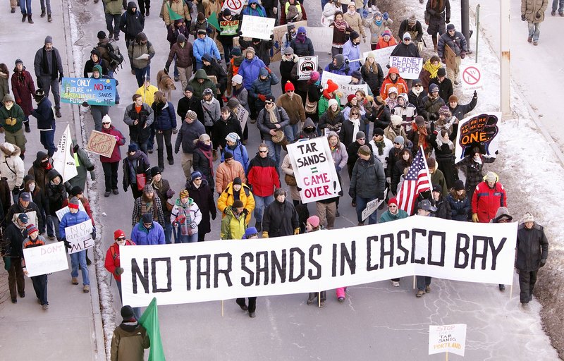 Hundreds of people march to the Maine State Pier in Portland in January to attend a rally protesting the possible use of the Portland-to-Montreal pipeline to send tar sands crude oil to Casco Bay.