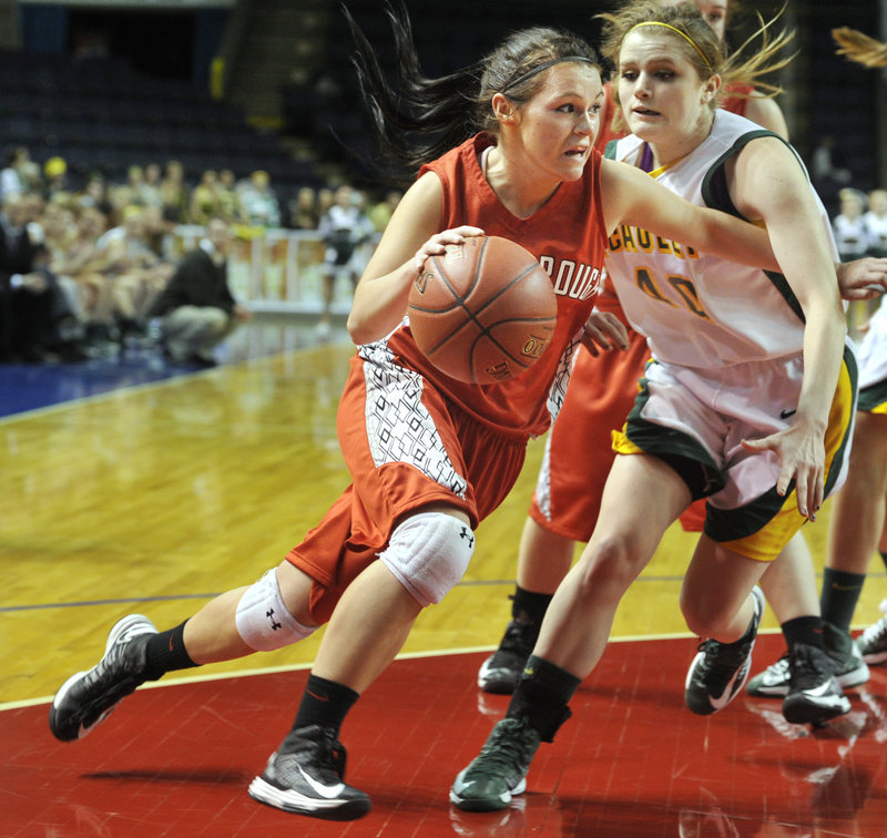 Scarborough senior Mary Redmond maneuvers around Jaclyn Welch of McAuley during their semifinal game last month. Redmond, who transferred to Scarborough before her junior year, became the team’s leading scorer.