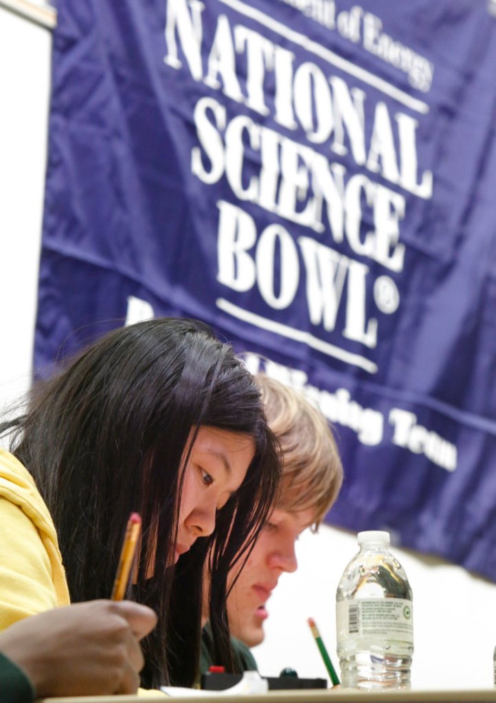Waynflete students Sally Li and Zander Majercik work out a problem in a semifinal round at the Science Bowl at the University of Southern Maine in Gorham on Saturday.