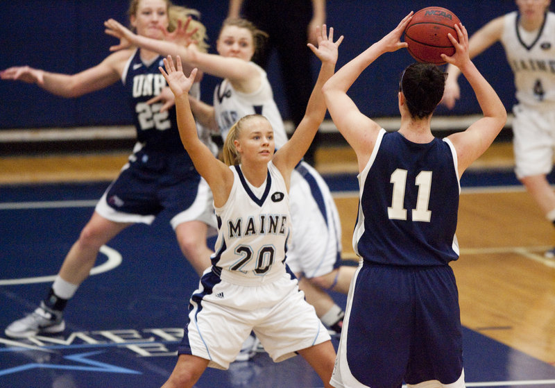 Maine guard Sophie Weckstrom puts pressure on Kaylee Kilpatrick of the University of New Hampshire, during an 86-63 New Hampshire win at Orono on Saturday.