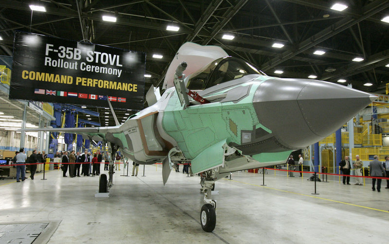 The Lockheed Martin F-35B is unveiled in Fort Worth, Texas, in 2007. The Defense Department should invest more in long-range missiles and less in “expensive aircraft like the F-35,” a reader says.