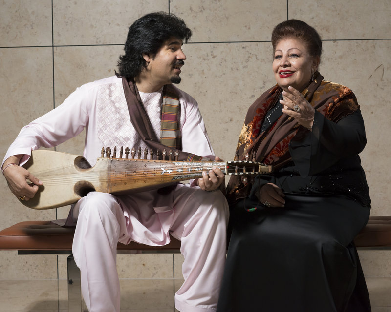 Homayoun Sakhi, left, is a master of the rubab, an Afghan lute that dates back 2,000 years. He leads the band Voices of Afghanistan, which is fronted by vocalist Farida Mahwash, right.