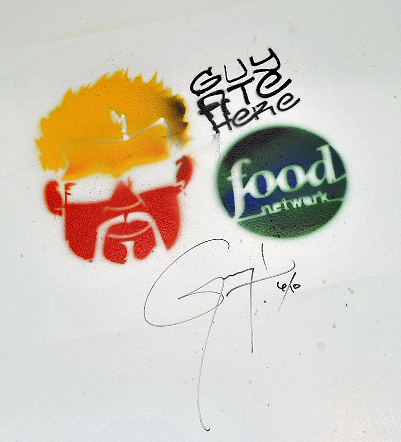 Guy Fieri left his mark when his Food Network show “Diners, Drive-Ins and Dives” visited the old Porthole in 2011. New owner Ken Macgowan said he plans to preserve the image in the restaurant’s newly renovated space.