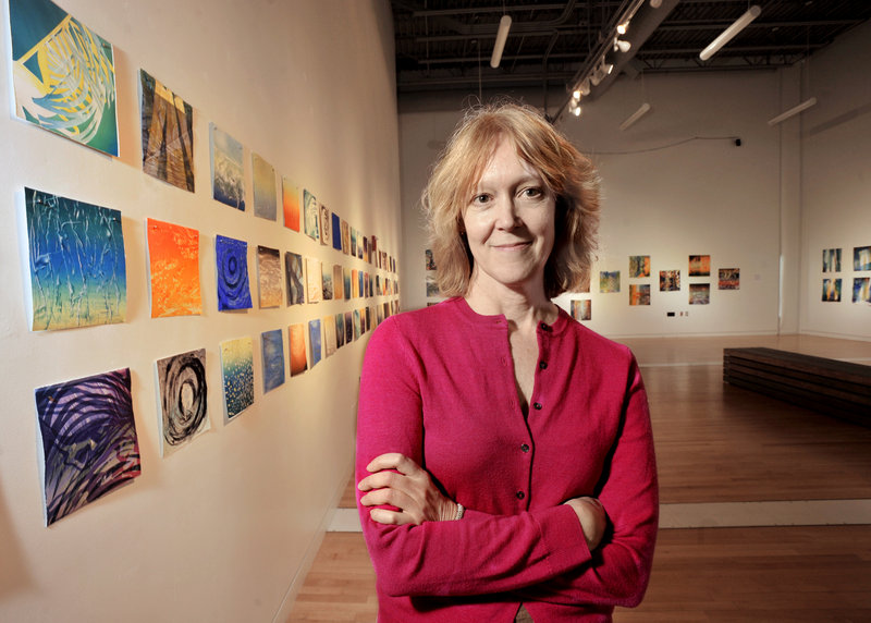 Emery Center director Jayne Decker in the visual arts gallery known as the Flex Space, which is currently showing works by Ellen Roberts and Karen Adrienne.