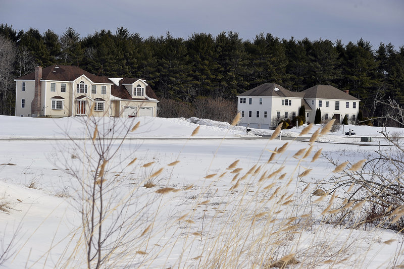 High-end residential developments like this one abut the Comstock family farm. The easement deal “is a great opportunity,” says Chris Comstock. “The farms are disappearing.”