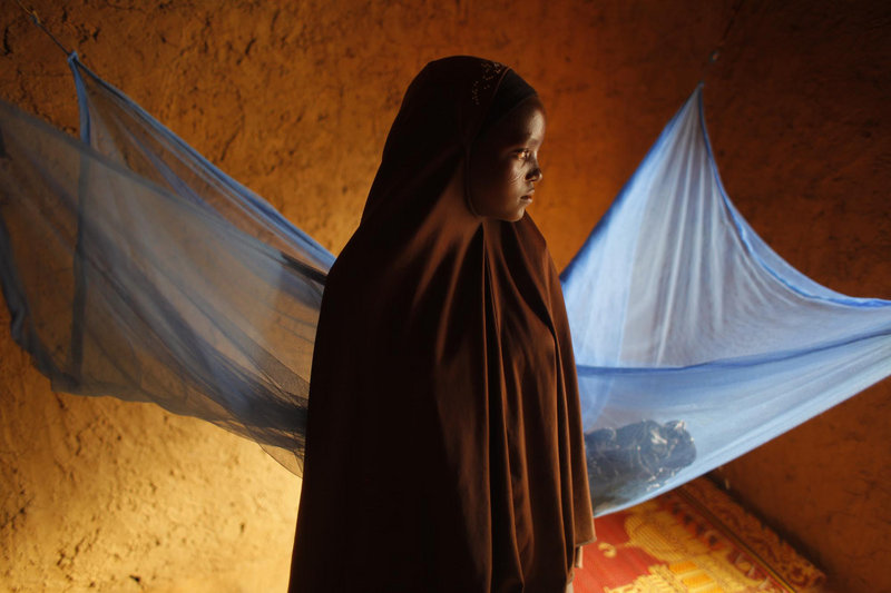 Zali Idy, 12, seen in her bedroom in the remote village of Hawkantaki, Niger, was married in 2011. In Niger, 75 percent of the girls under 18 are married – the highest rate in the world. Experts say that forced marriage for young girls leads to higher mortality rates, fewer girls attending school, and abuse within the marriage.