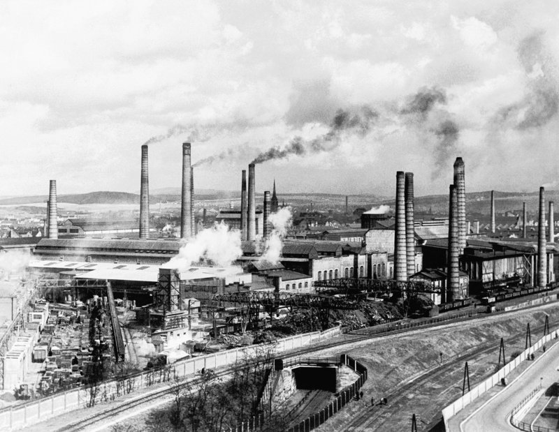 Smoke rises from Skoda’s main foundry in Pilsen, Czechoslovakia, in 1938. A new study looks at 11,000 years of temperatures.