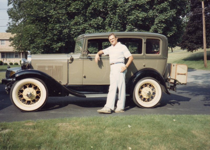 Aime Alfred Levecque stands with “Daisy,” his 1931 Model A, around 1990. He loved to take his grandchildren for rides in it.
