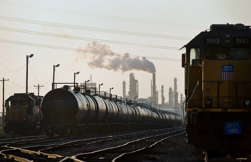 Rail tanker cars, like these in Corpus Christi, Texas, are being used to ship crude oil, making huge profits for railroads, as the White House ponders the fate of the Keystone XL pipeline. Shipments jumped 256 percent in 2012.