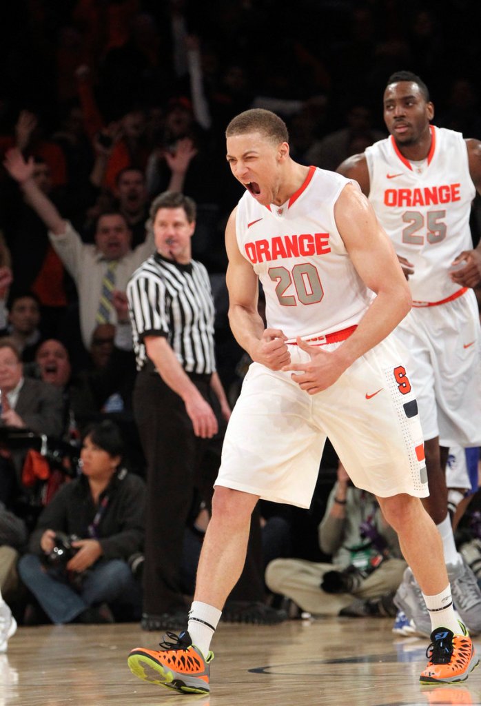 Brandon Triche keyed a big second-half run Wednesday as Syracuse beat Seton Hall to advance to the Big East quarterfinals at Madison Square Garden.