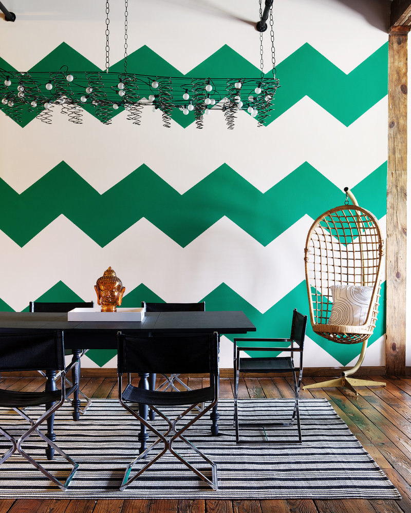 Stencils create the look of patterned wallpaper for a burst of color, as seen in “The First Apartment Book: Cool Design for Small Spaces,” by Kyle Schuneman.