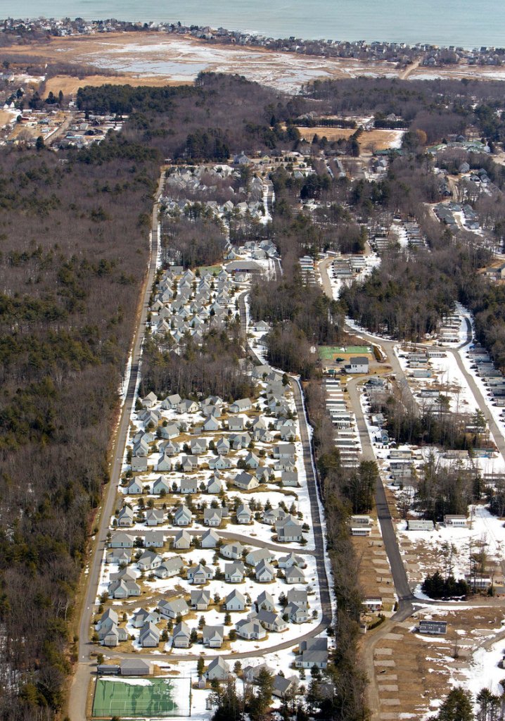 The Cottages at Summer Village are among the large lodging developments that pose a dilemma for the town of Wells, bringing in needed property tax revenue but stressing local services and adding to traffic congestion on Route 1.
