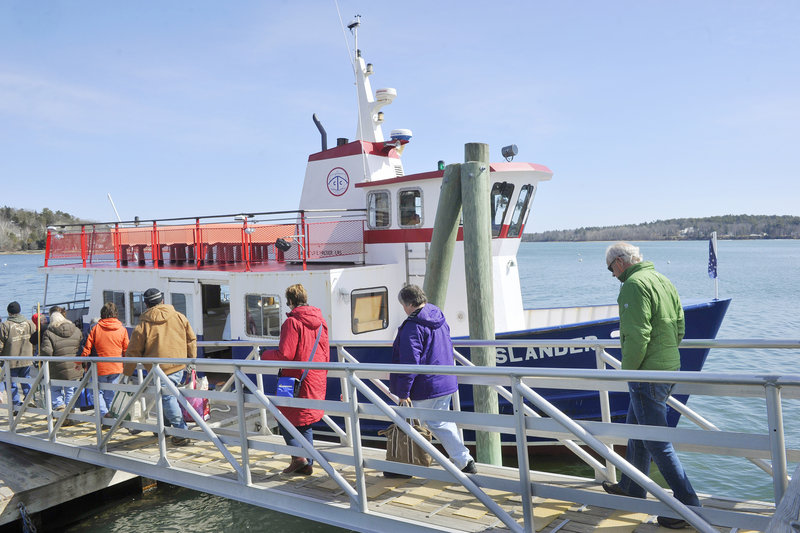Chebeague Island-bound passengers file aboard the ferry Islander from the pier on Cousins Island. After an informal start, the Chebeague Transportation Co. formed in 1971.