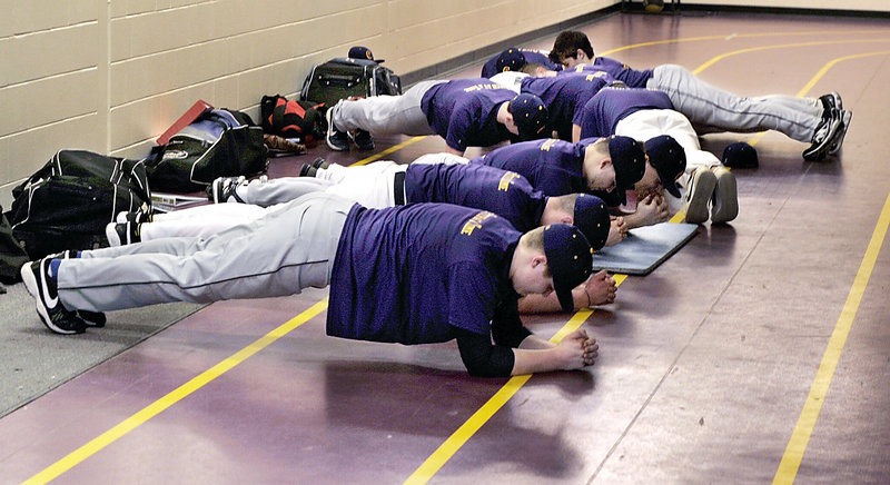 Arm strength is important for pitchers, but so too is overall conditioning as Cheverus players tone up their stomach muscles before they run on the track in the first official day of baseball practice.