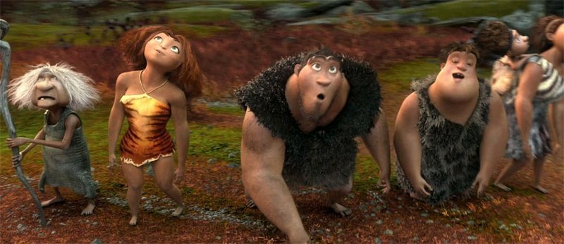 Gran (left, voiced by Cloris Leachman), Eep (Emma Stone), Grug (Nicolas Cage) and Thunk (Clark Duke) in a scene from “The Croods.”
