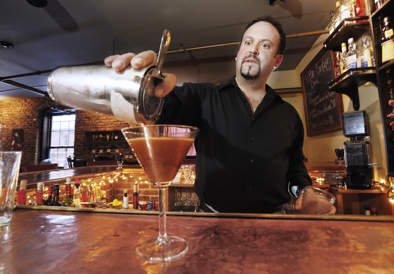 Bartender Kevin Goodell makes an espresso martini at the Bar of Chocolate in Portland.
