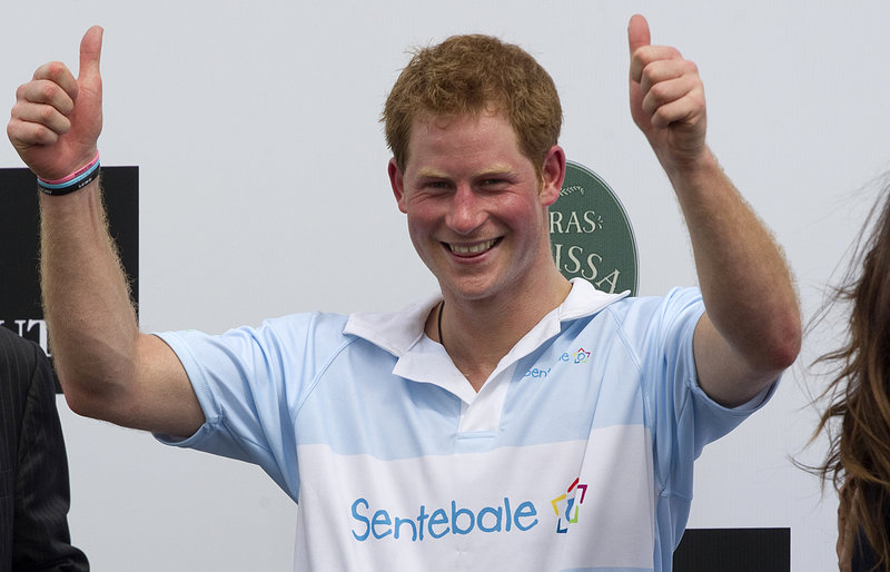 Britain’s Prince Harry gives a thumbs-up during the award ceremony after playing a charity polo match in Campinas, Brazil, this month. Prince Harry is visiting the East Coast in May.