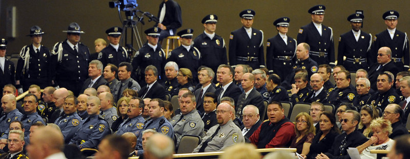 Law enforcement and corrections officers attend a memorial service for Tom Clements, the chief executive of the Department of Corrections, at New Life Church in Colorado Springs, Colo., on Monday. Clements was shot and killed on the doorstep of his home last week in Monument, Colo.