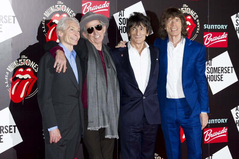The Rolling Stones – from left, Charlie Watts, Keith Richards, Ronnie Wood and Mick Jagger – will perform June 29 at one of Britain’s top music festivals.