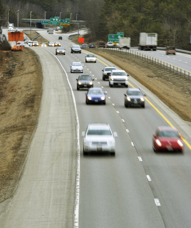 Traffic flows along Interstate 295 near the Falmouth exit on Wednesday March 27, 2013. A bill now before the Legislature would allow Maine's transportation commissioner to raise the speed limit to 75 mph on I-195 and Interstate 95.