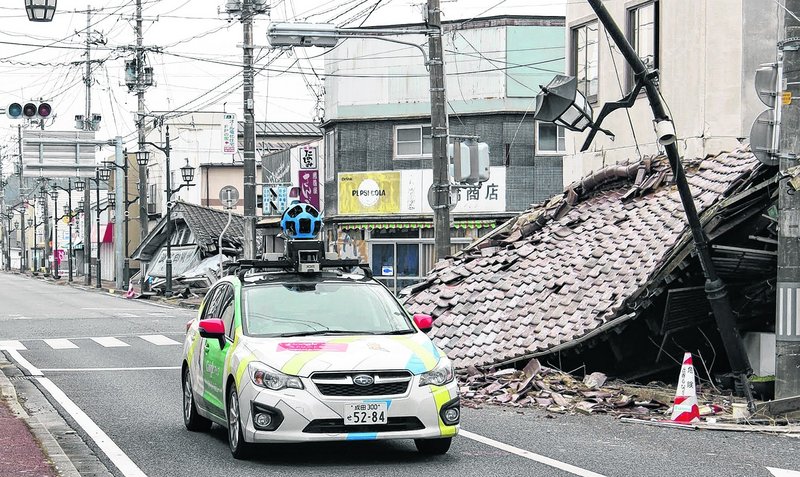 Google’s camera-equipped car moves through Namie, Japan, sill uninhabitable because of radioactive contamination from the Fukushima Dai-ichi nuclear power plant two years.