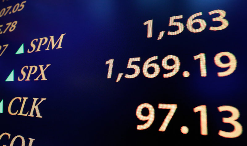 A board on the New York Stock Exchange floor Thursday shows the closing S&P 500 index number.