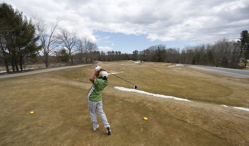 Nonesuch River is the gauge for other clubs opening because the first nine holes are exposed to the sun. Zach Steele hits a drive on the first hole Friday.