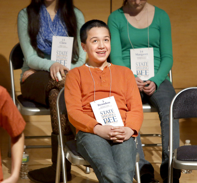 Brandon Aponte, a seventh-grader representing Hancock County, smiles at family members in the crowd after correctly spelling “pretzel” in the early rounds of the Maine State Spelling Bee at the University of Southern Maine in Portland on Saturday. Brandon went on to beat 14 competitors to become the state’s spelling bee champion.
