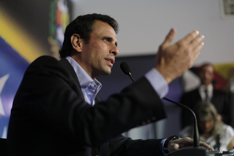Opposition leader Henrique Capriles speaks during a press conference in Caracas, Venezuela, on Friday. Capriles, a long-shot candidate to succeed the late President Hugo Chavez, called Vice President Nicolas Maduro a bold-faced liar and accuses him of using Chavez's funeral to campaign for the presidency.