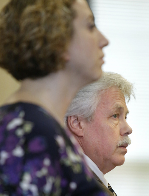 Mark Strong Sr. and his co-counsel Tina Nadeau (foreground) look to the jury as the jury foreman calls out guilty on the thirteen charges against him at York County Superior Court in Alfred on Wednesday. Strong faced 12 counts of promotion of prostitution and one count of conspiracy to promote prostitution for his connection with Alexis Wright, who is accused of running a prostitution business out of her Zumba studio in Kennebunk.