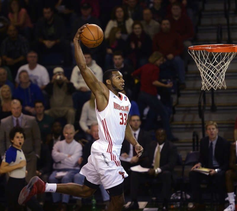 Chris Wright of the Maine Red Claws goes up for a dunk on a fast break against Sioux Falls Skyforce Sunday, December 2, 2012. With the Maine Red Claws rolling into the playoffs Thursday, April 10, 2013 for the first time in the team's four-year history, supporters discuss their love for the team.