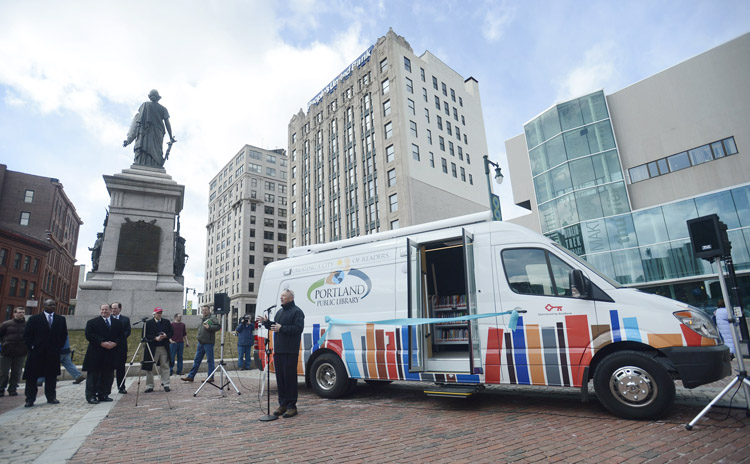 Portland Mayor Michael Brennan speaks during the unveiling of a new Book Mobile Tuesday in Monument Square. The vehicle will increase access to books, technology and education programming for under-served areas of the community.