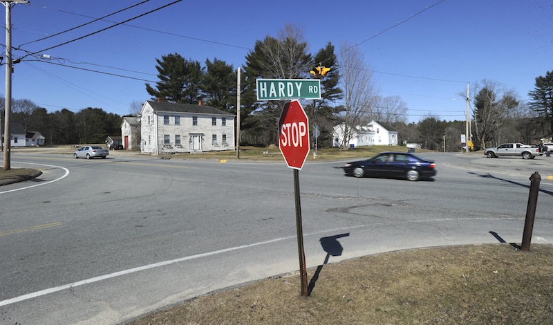 This April 9, 2013 photo shows cars traveling west on Route 302 in Westbrook where a proposed rotary for the Intersection of Route 302, Duck Pond Road and Hardy Road is being considered.