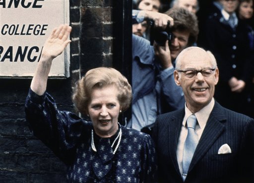 In this June 9, 1983, photo, British Prime Minister Margaret Thatcher leaves a London polling station with her husband, Dennis, after casting their votes in the general election.