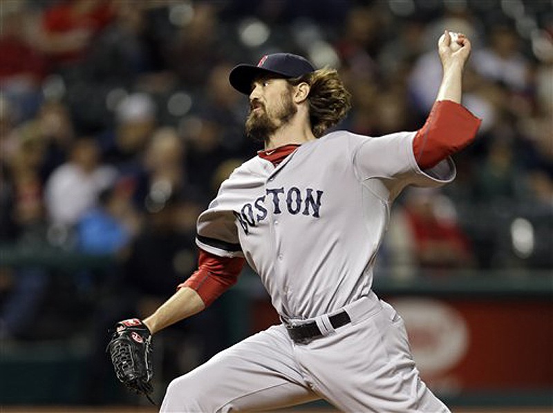 Red Sox relief pitcher Andrew Miller delivers against the Cleveland Indians in the eighth inning Thursday in Cleveland. The Red Sox won 6-3. Progressive Field