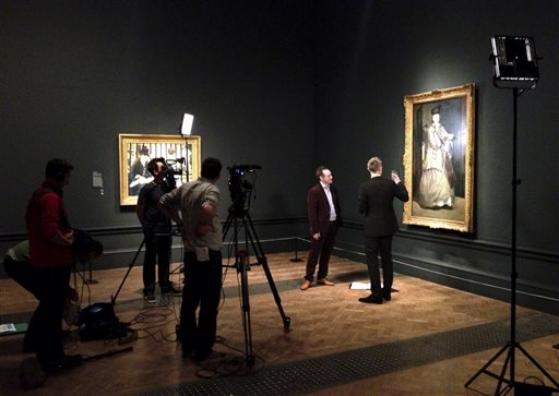 A film crew works on a film about an exhibit devoted to the portraiture of Edouard Manet at the Royal Academy of Arts in London.