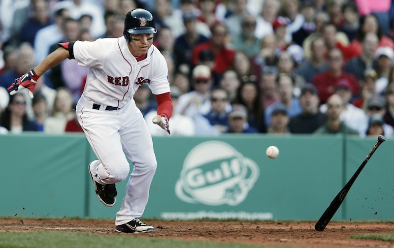 Boston's Jacoby Ellsbury runs out a hit near the plate that was ruled foul during the fifth inning Wednesday.